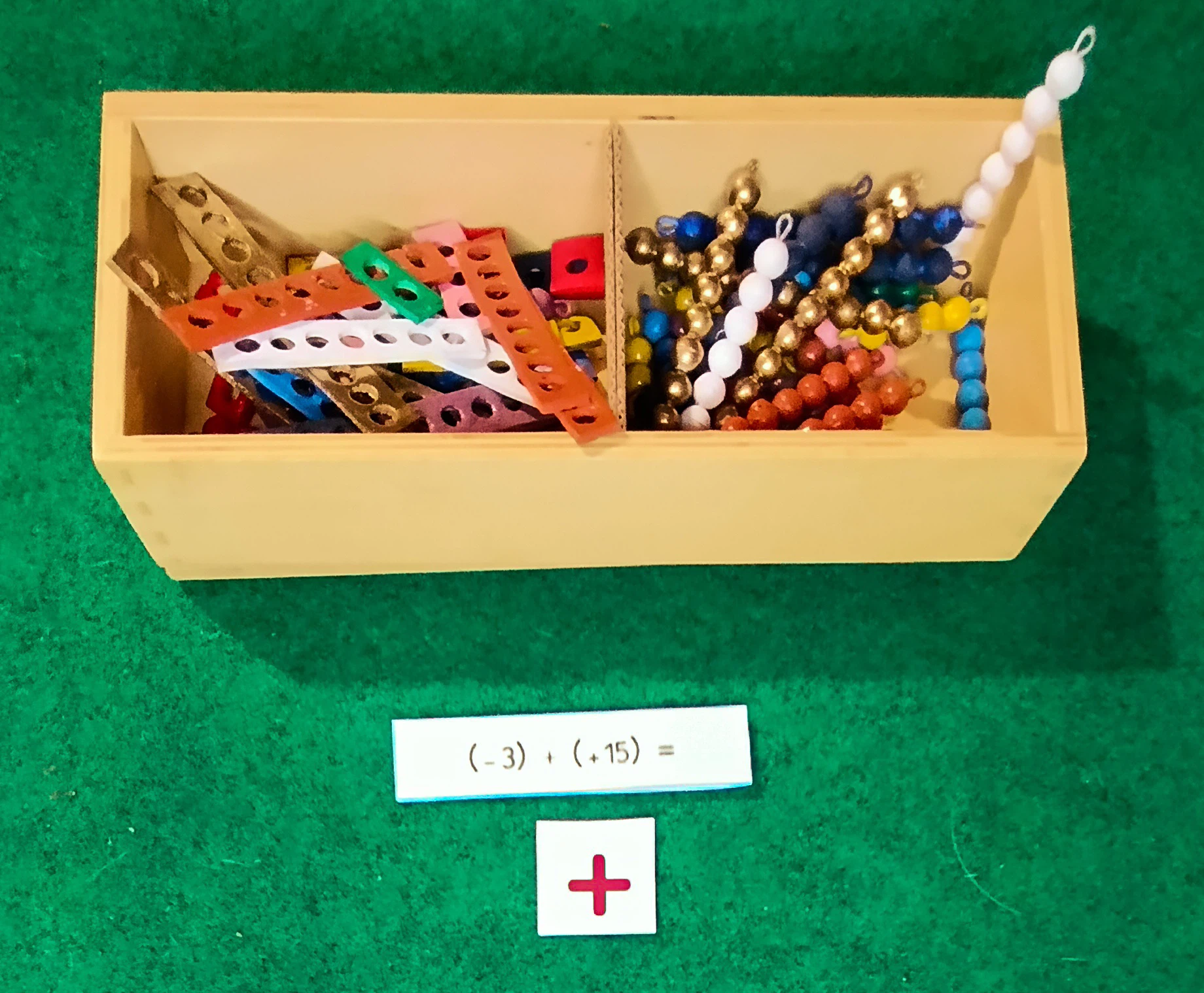 Addizione di numeri relativi col materiale Grüner